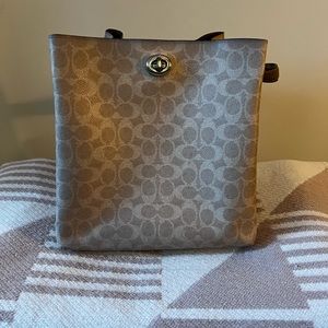 Cream Coach handbag